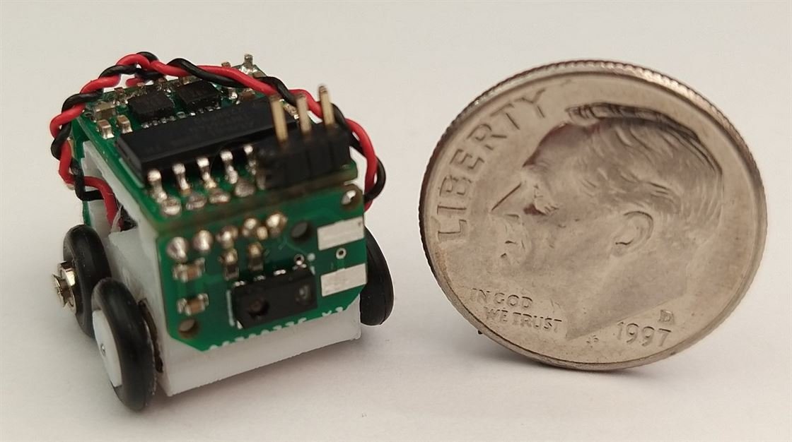Dimebot next to a United States dime